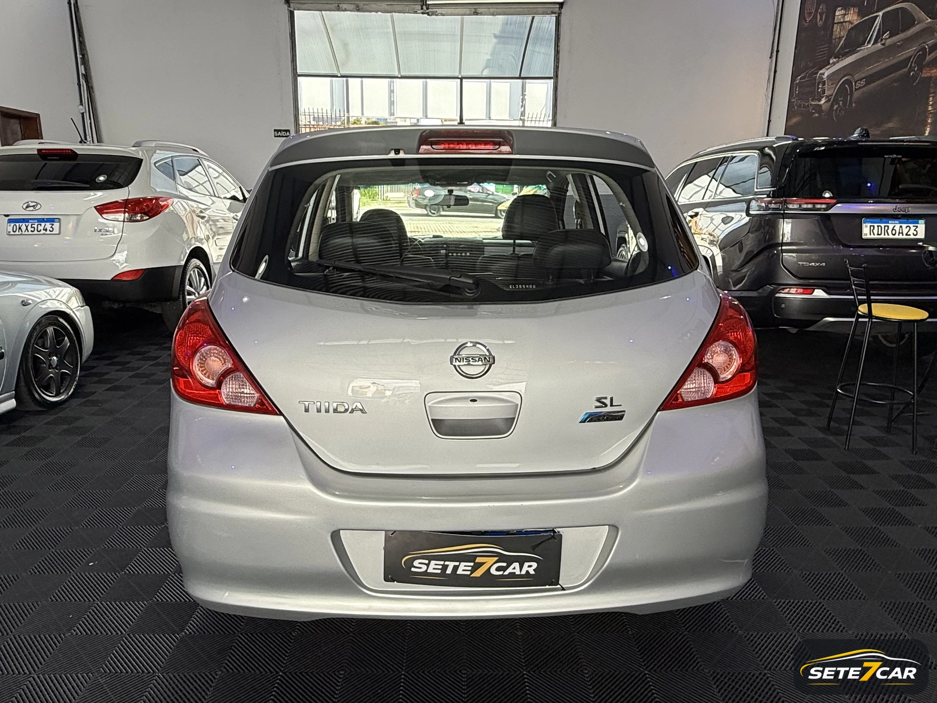 Nissan Tiida SL 2012 prata — foto